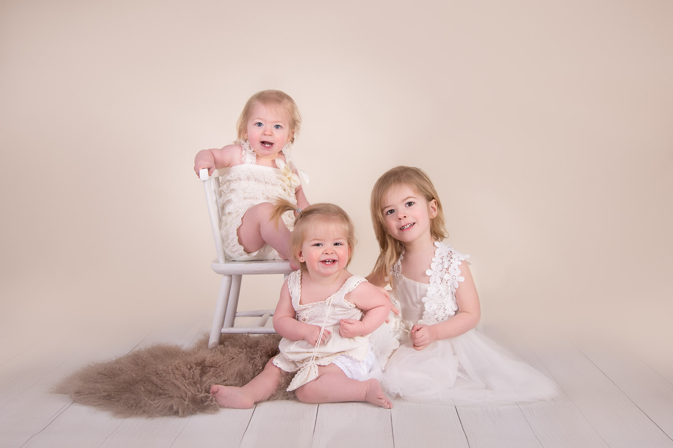 Image of 3 sisters posing for classic session from Halifax Family Photographer