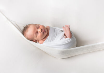 Baby sleeping on a white background